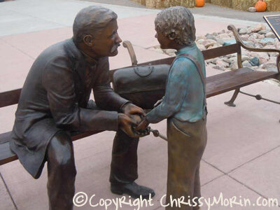 don-budy-sculpture parker station victorian peaks mainstreet town of parker colorado