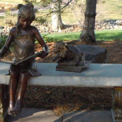 Parker Library Park girl reading book statue